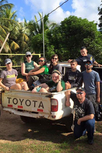 Mason engineering students in a truck in Nicaragua