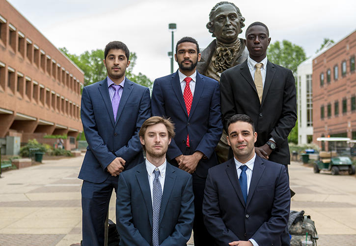Five systems engineering seniors developed a system, which includes a wearable device connected to an app, to help patients with frozen shoulder syndrome. Pictured here, left to right back row: Faisal Alharbi, Blaine Lacey, Emmanuel Kwakye-Dompreh. Front row: Will Calaman and Farzad Nikpanjeh.